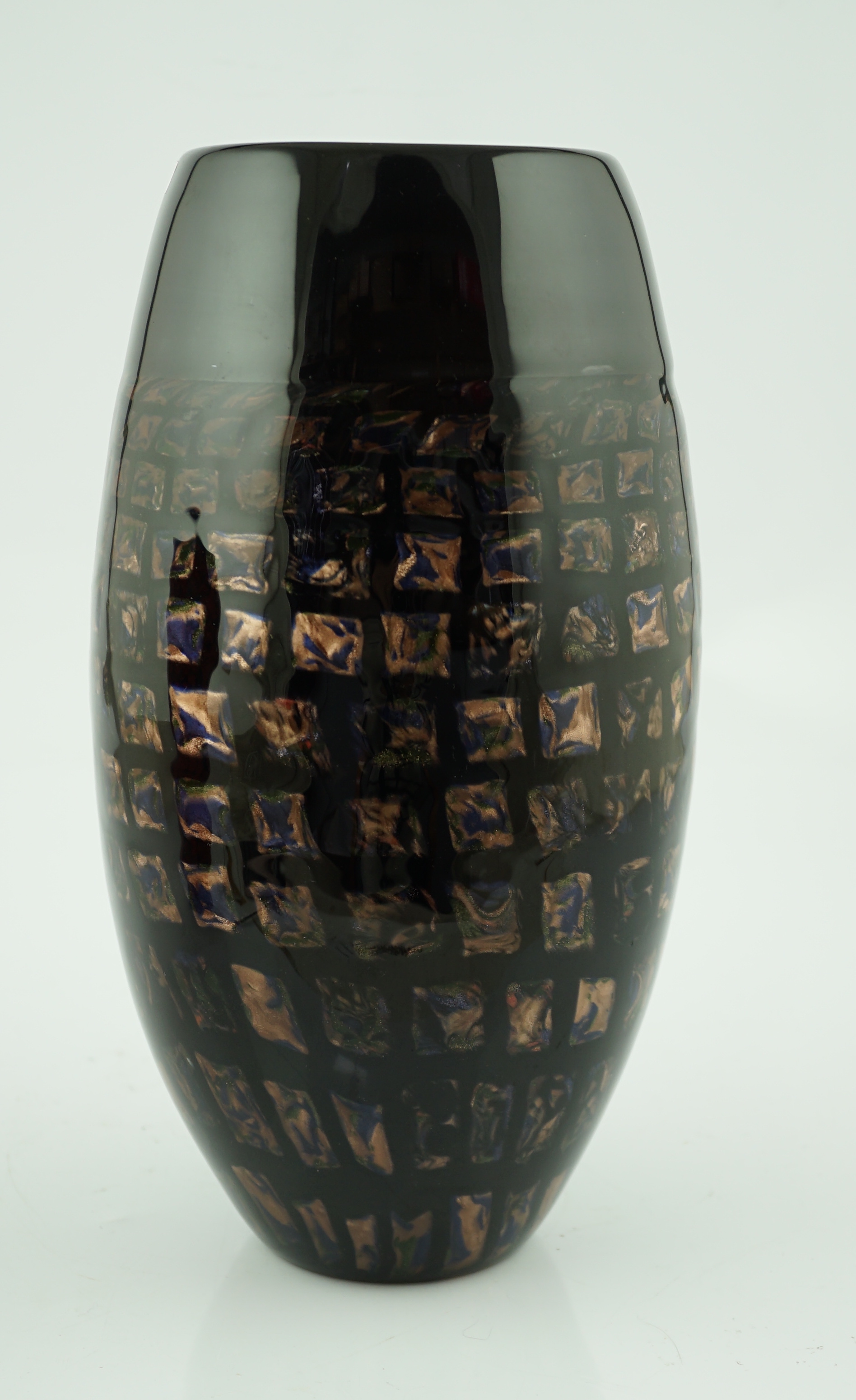 Vittorio Ferro (1932-2012) A Murano glass, black ground vase, with a spiral design of small aventurine squares, under a broad upper band, unsigned, 35.5cm, Please note this lot attracts an additional import tax of 20% on